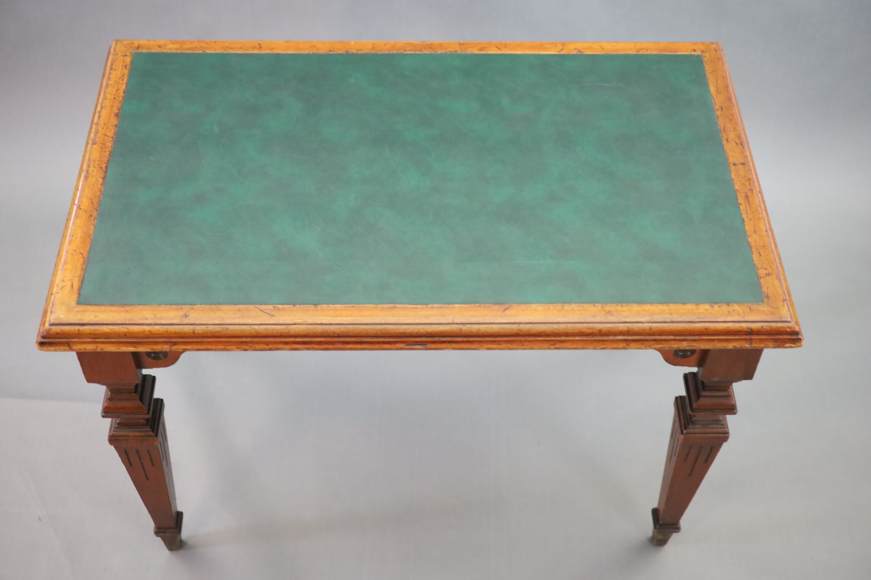 A Victorian mahogany library table, supplied by Sage & Co. Shopfitters of London, W.113cm D.69cm H.78cm